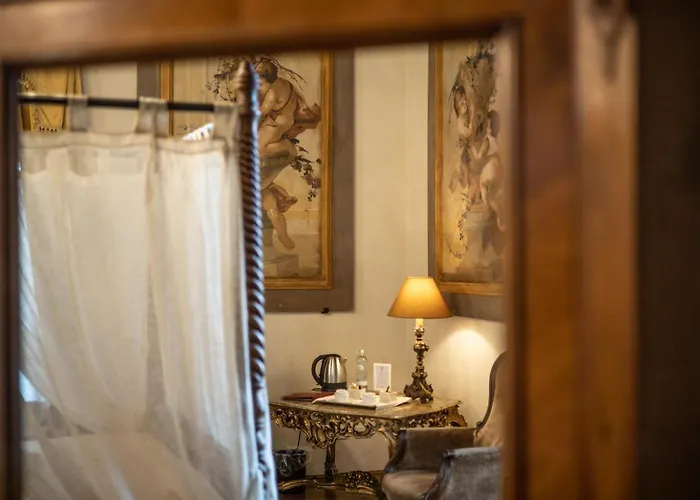 Отель Relais Castello 4*